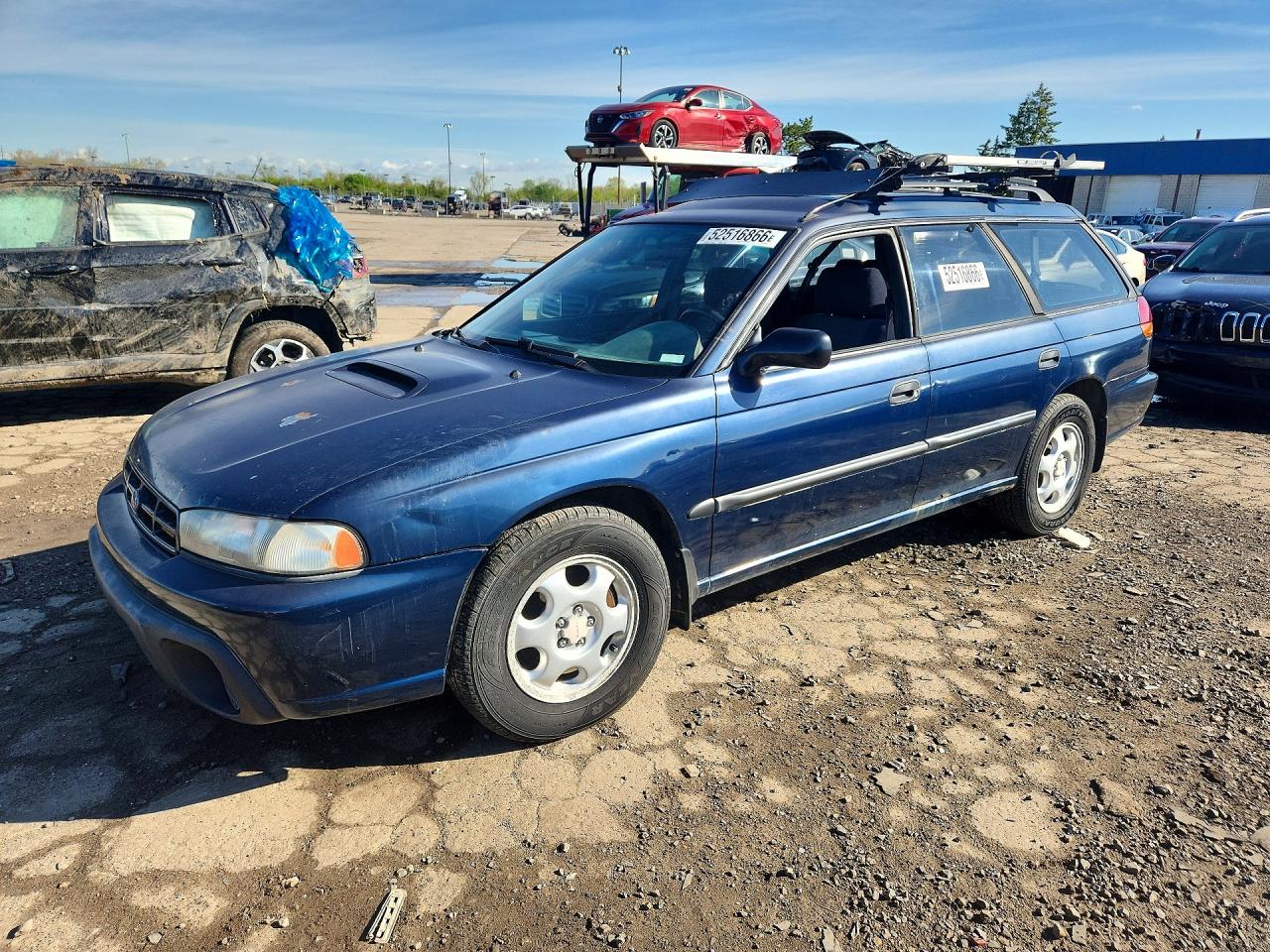 1997 Subaru Legacy Outback, VIN 4S3BG6854V6648503 — Мелкие вмятины и царапины