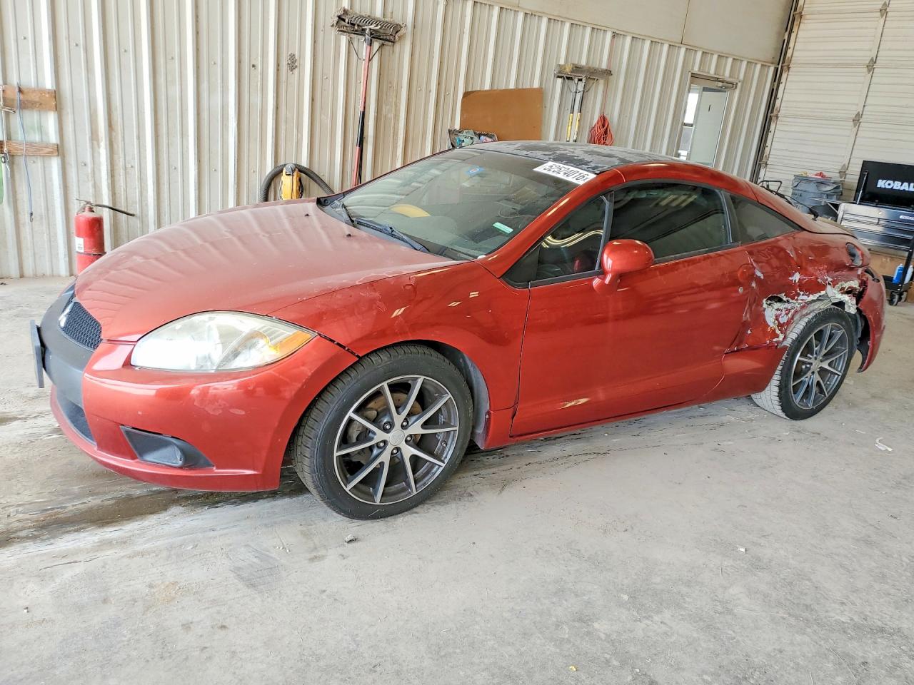 2012 Mitsubishi Eclipse GS, VIN 4A31K5DF2CE005389 — Side