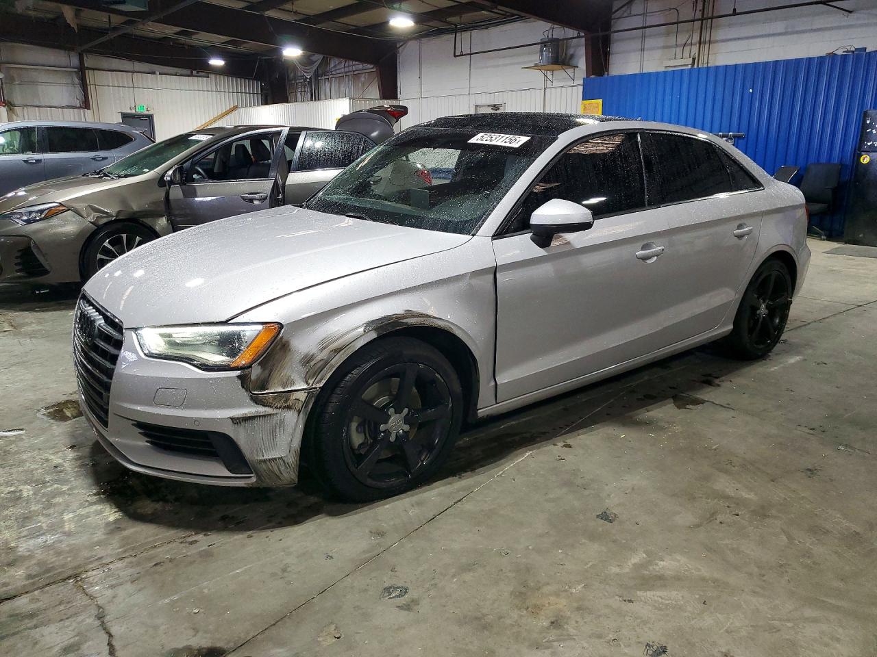 2016 Audi A3 Premium, VIN WAUB8GFF0G1082450 — Бок