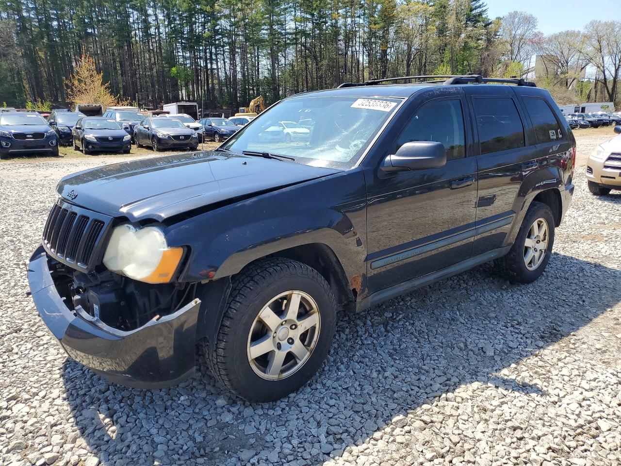 2009 Jeep Grand Cherokee Laredo, VIN 1J8GR48K19C528541 — Front end