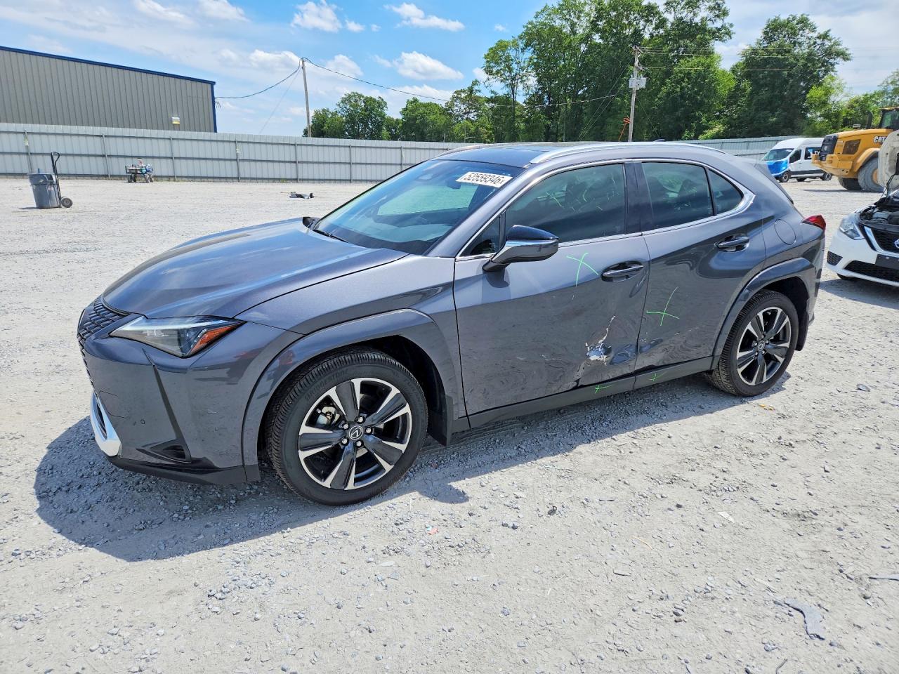 2025 Lexus UX 300h, VIN JTHYBJAH0S2018821 — Бок