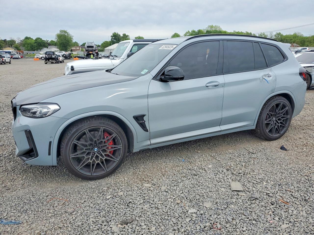 2022 BMW X3 M, VIN 5YM13EC00N9J89585 — Side