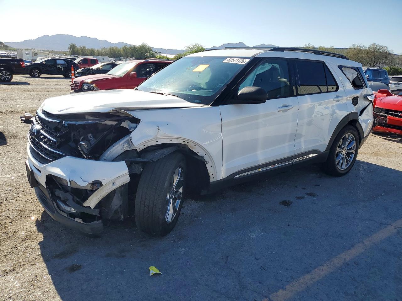 2022 Ford Explorer XLT, VIN 1FMSK7DH9NGC00591 — Side