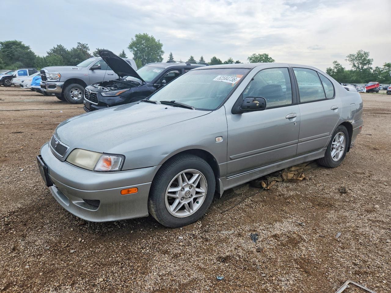 2002 Infiniti G20 Luxury, VIN JNKCP11A02T502772 — Hail