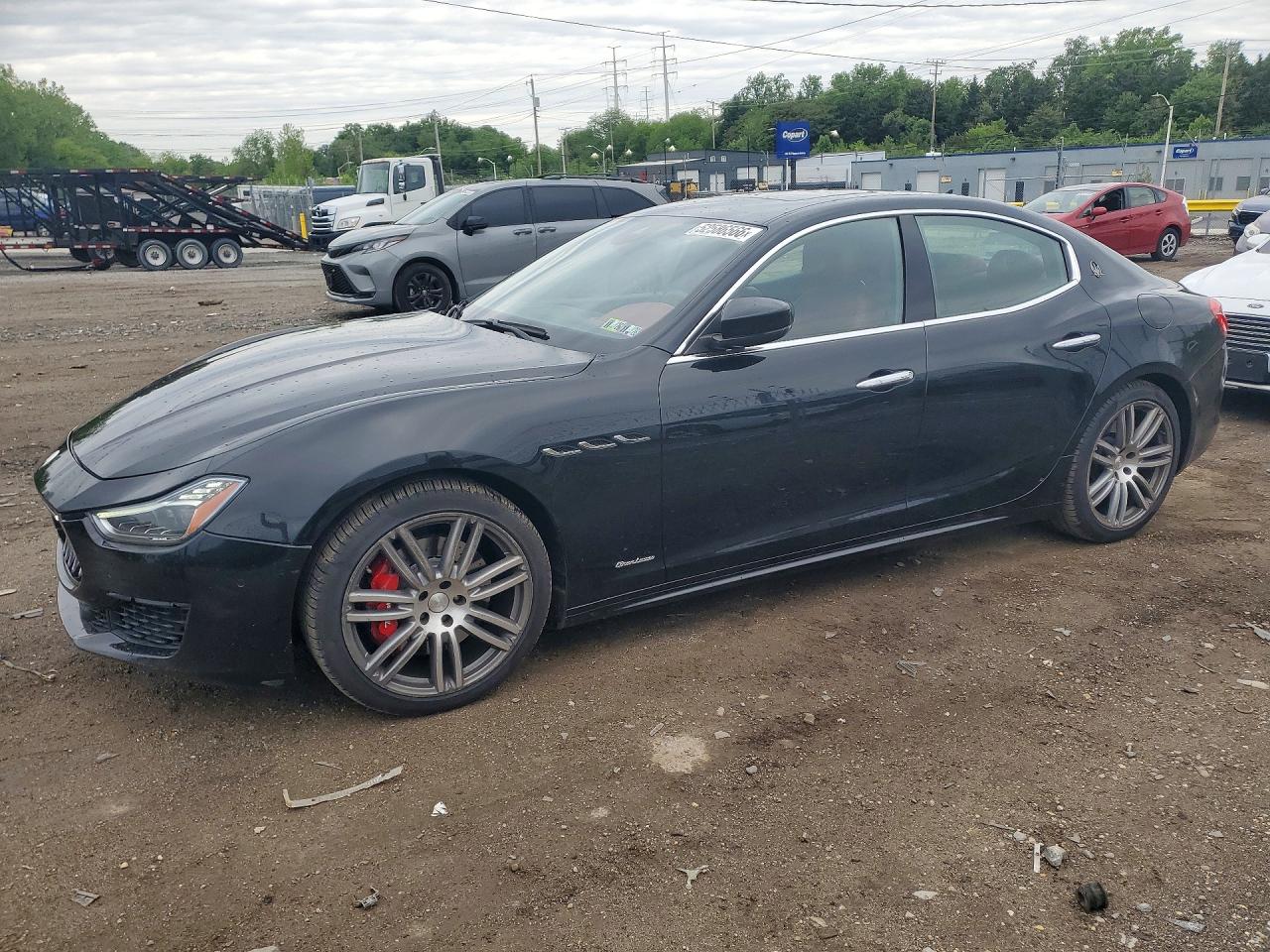2018 Maserati Ghibli S Q4 GranLusso, VIN ZAM57YTL7J1290833 — Side