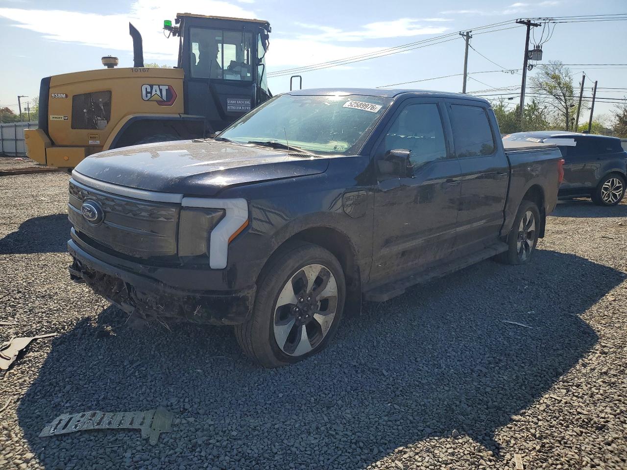 2023 Ford F-150 Lightning Platinum, VIN 1FT6W1EVXPWG02026 — Front end