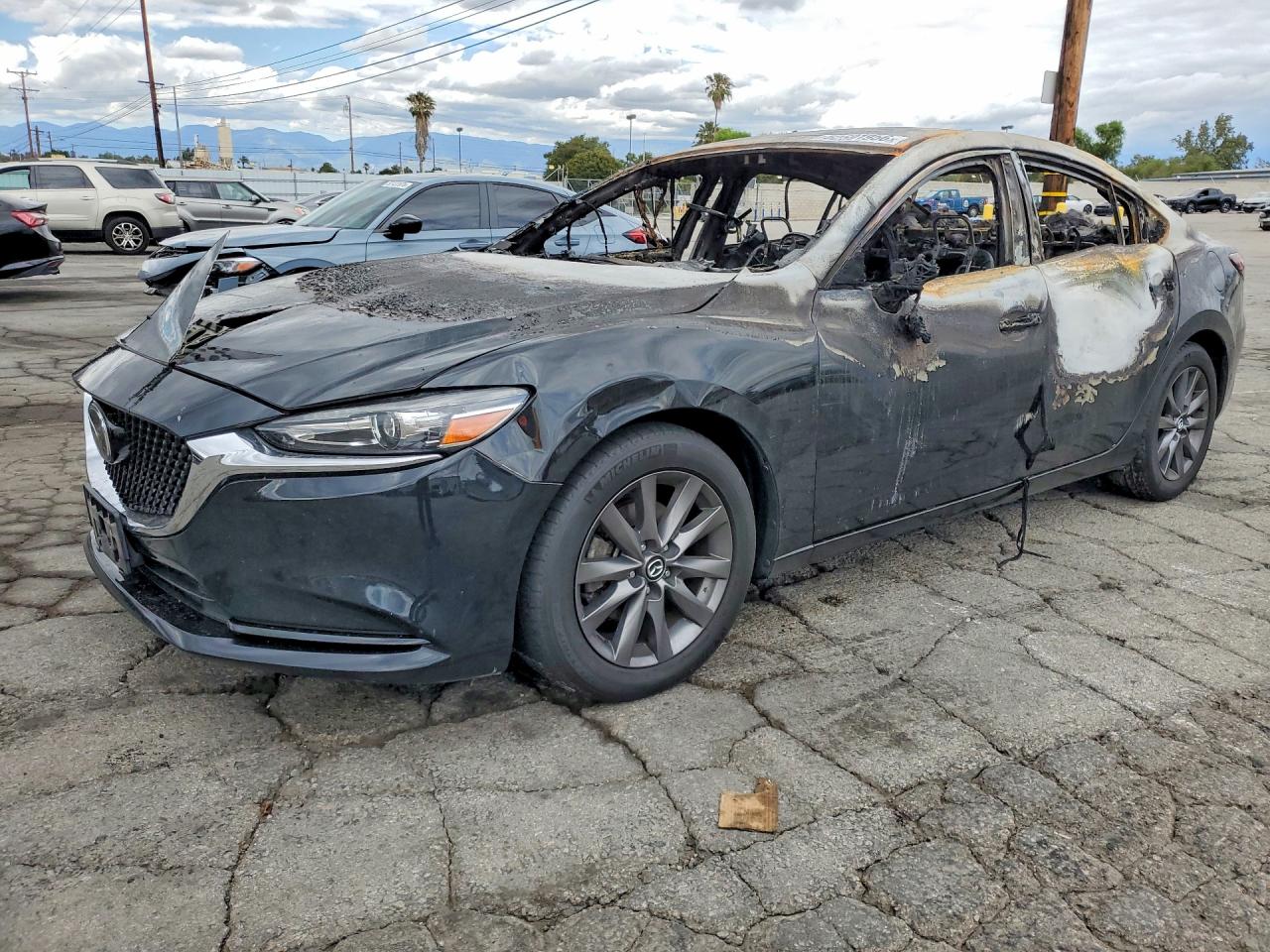 2021 Mazda 6 Sport, VIN JM1GL1UM1M1601958 — Burn