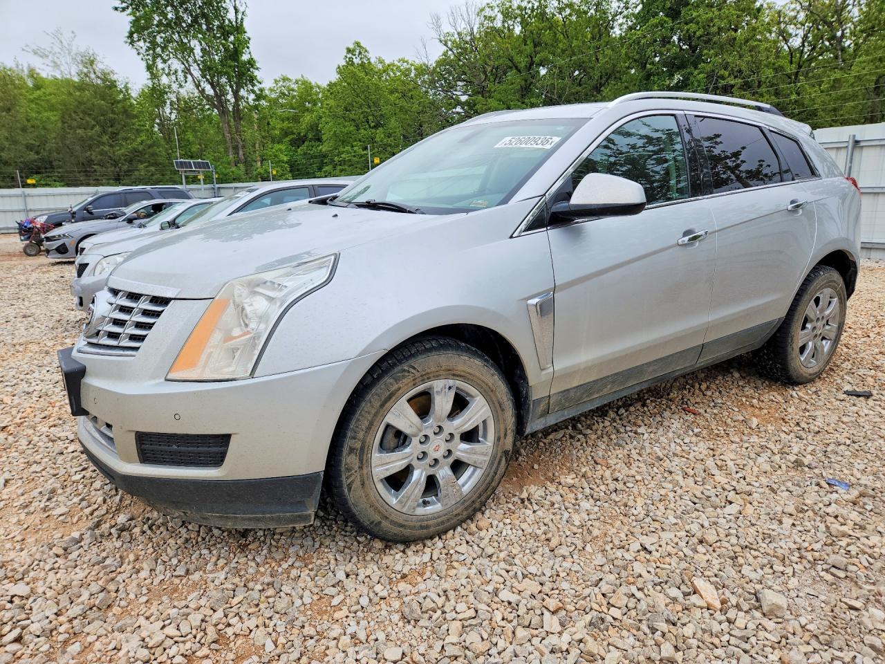 2016 Cadillac SRX Luxury Collection, VIN 3GYFNEE30GS577488 — Hail