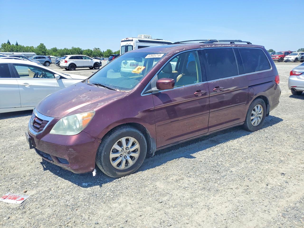 2010 Honda Odyssey EX-L, VIN 5FNRL3H6XAB033924 — Minor dents and scratches