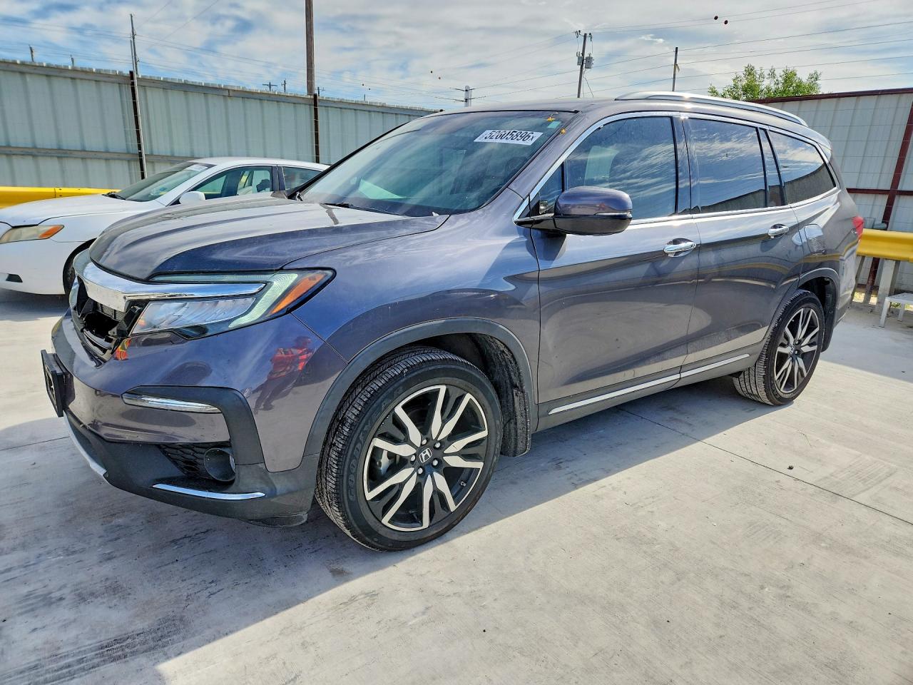 2020 Honda Pilot Touring 7-Passenger, VIN 5FNYF5H61LB021615 — Hail