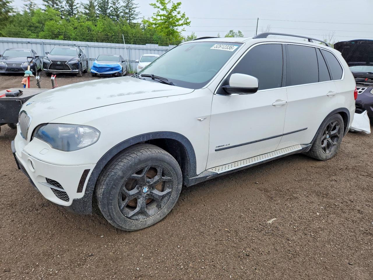 2011 BMW X5 50i, VIN 5UXZV8C5XBLL67809 — Зад