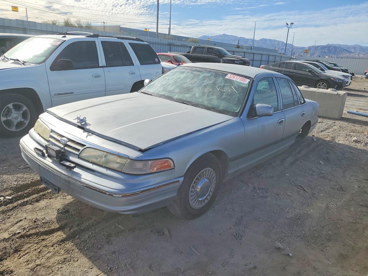1997 Ford Crown Victoria Police, VIN 2FALP71W6VX154800 — Side
