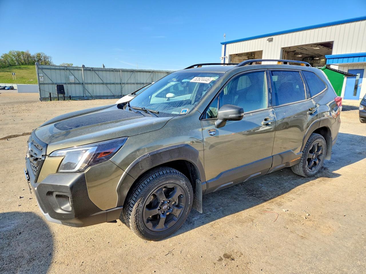 2022 Subaru Forester Wilderness, VIN JF2SKAMC9NH521421 — Auction photo 1 of 12