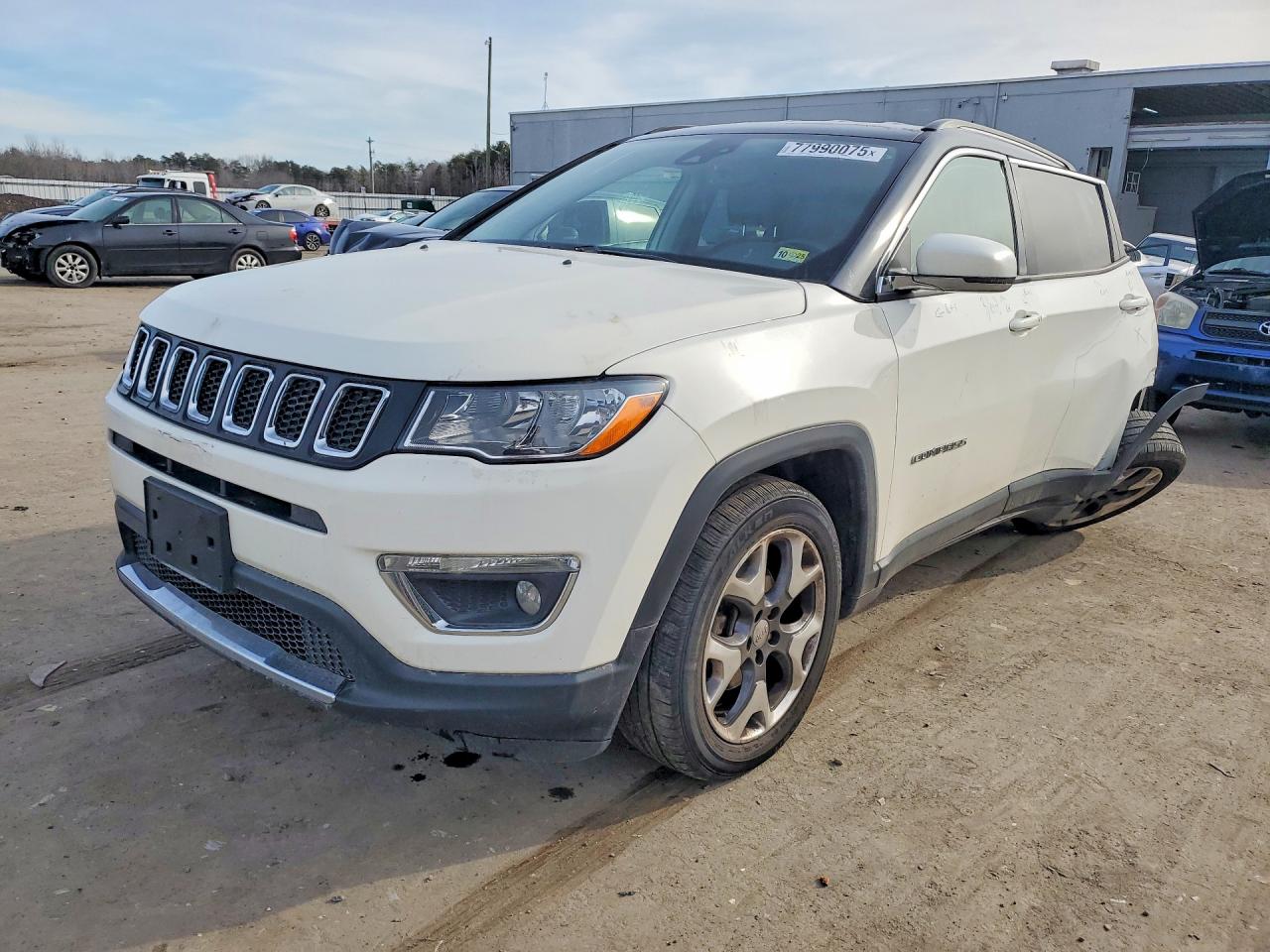 2020 Jeep Compass Limited, VIN 3C4NJCCBXLT107971 — Side