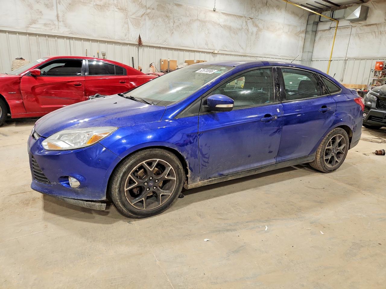2014 Ford Focus SE, VIN 1FADP3F20EL222623 — Vandalism
