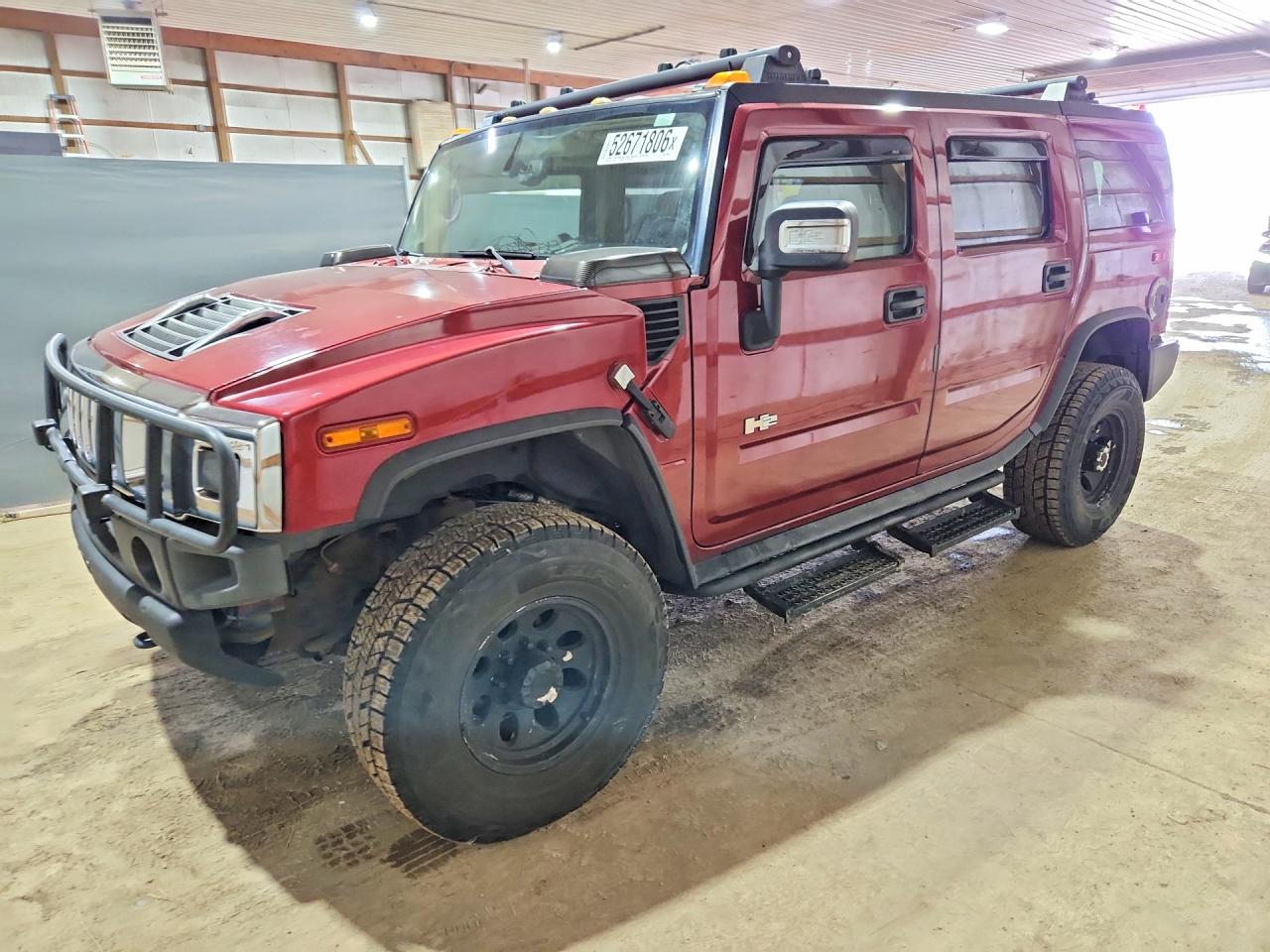2003 Hummer H2, VIN 5GRGN23UX3H119964 — Hail