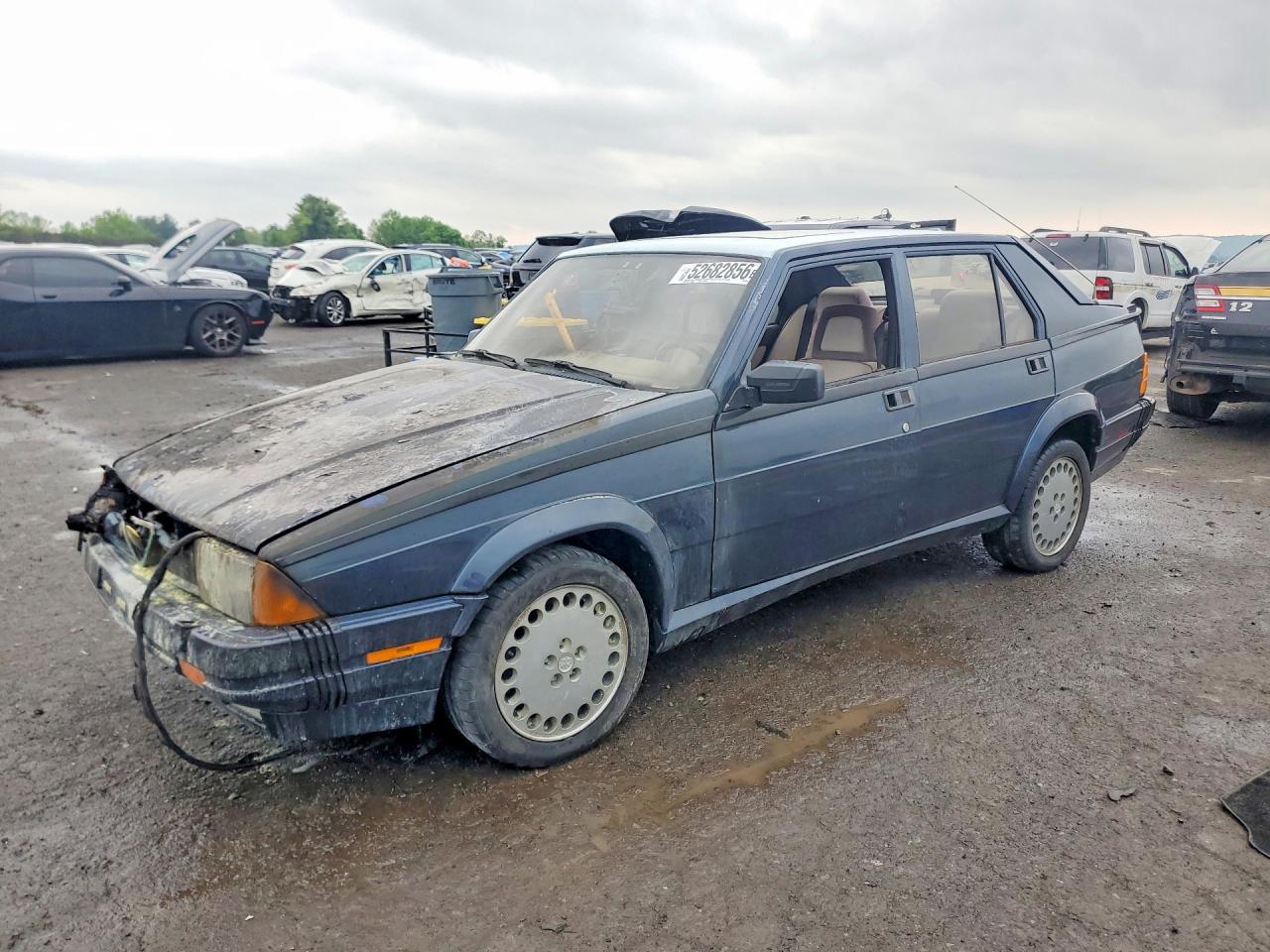 1987 Alfa Romeo Milano, VIN ZARDA1361H1025523 — Engine fire