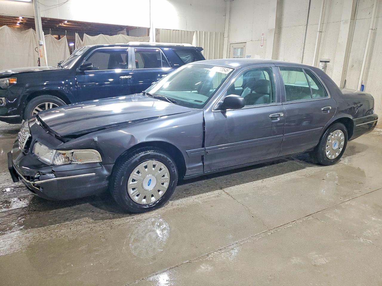 2005 Ford Police Interceptor, VIN 2FAHP71W55X136827 — Side