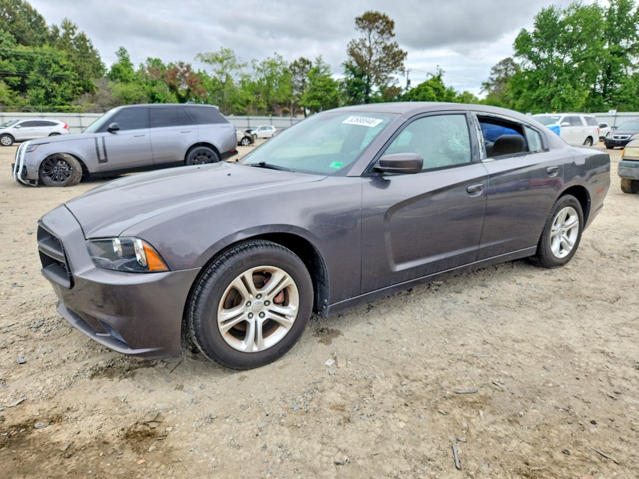 2014 Dodge Charger SE, VIN 2C3CDXBG2EH117087 — Vandalism