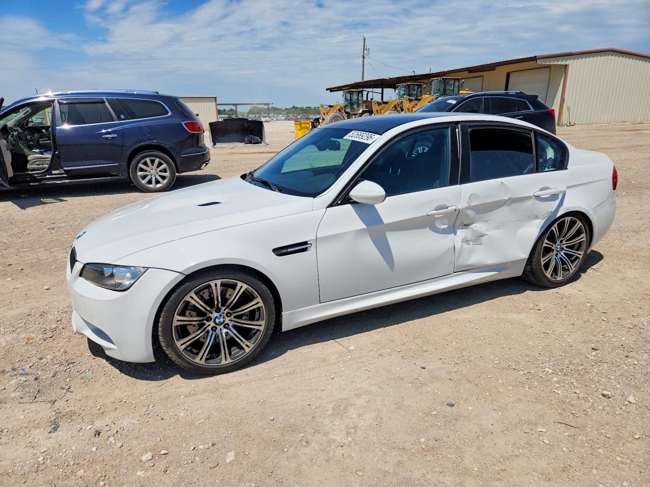 2011 BMW M3, VIN WBSPM9C56BE203763 — Side