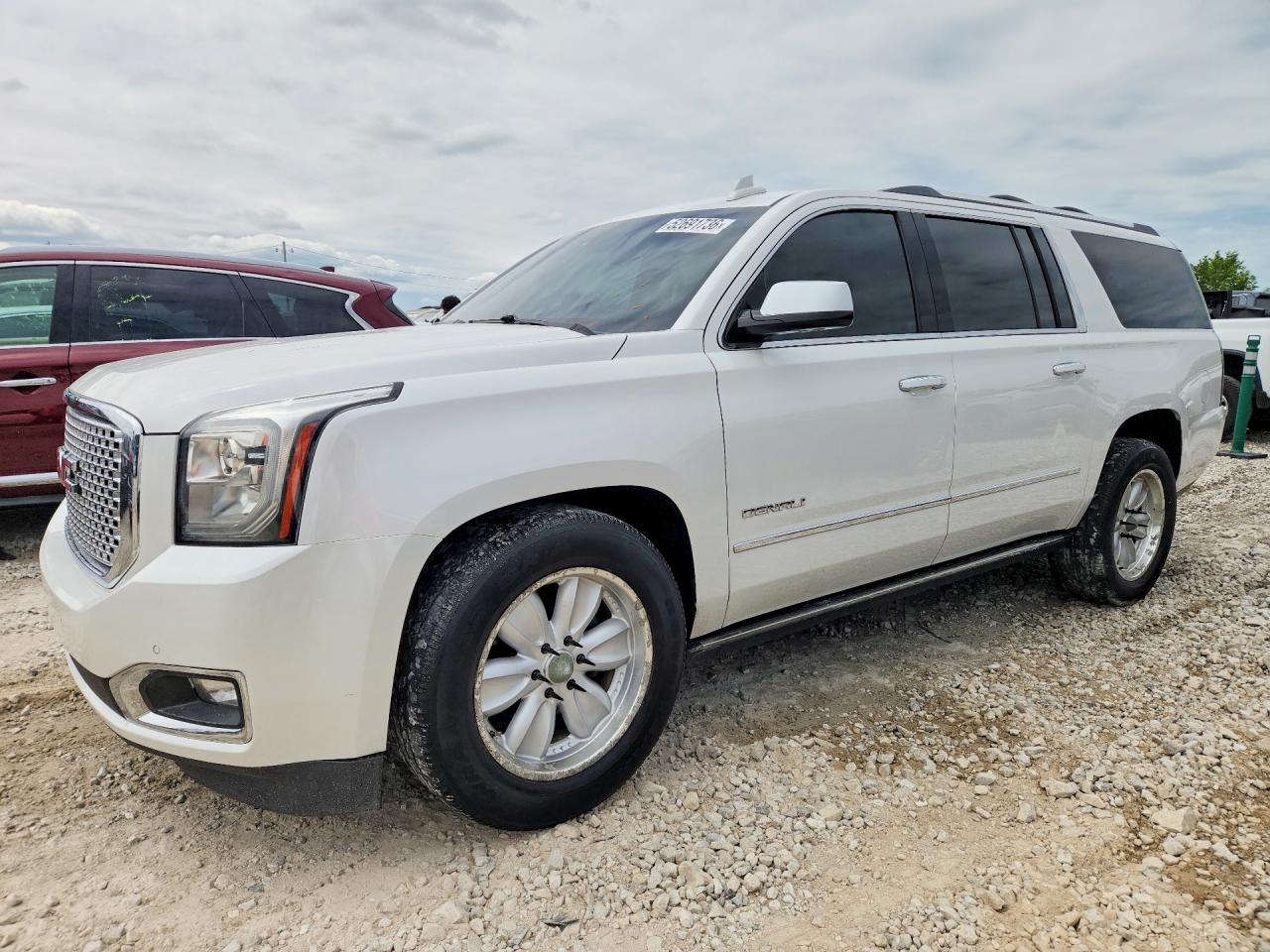 2017 GMC Yukon XL Denali, VIN 1GKS2HKJ5HR335662 — Hail