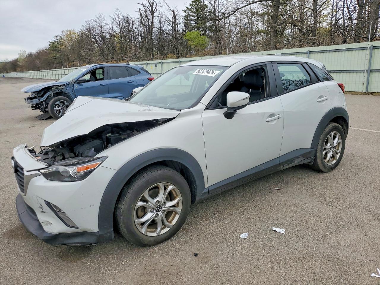 2016 Mazda CX-3 Touring, VIN JM1DKBC70G0116941 — Front end