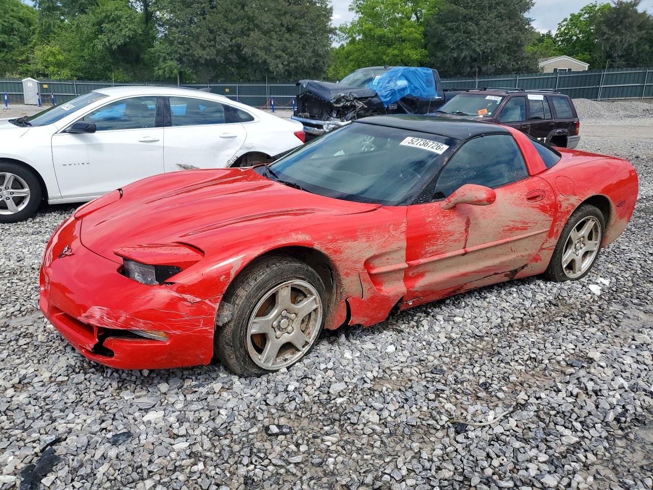 1999 Chevrolet Corvette, VIN 1G1YY22GXX5133078 — Side