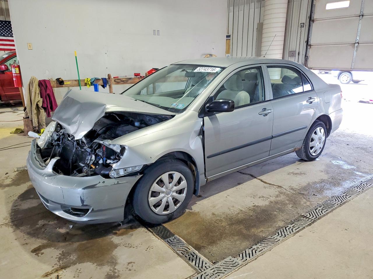 2003 Toyota Corolla CE, VIN JTDBR32E032007869 — Front end
