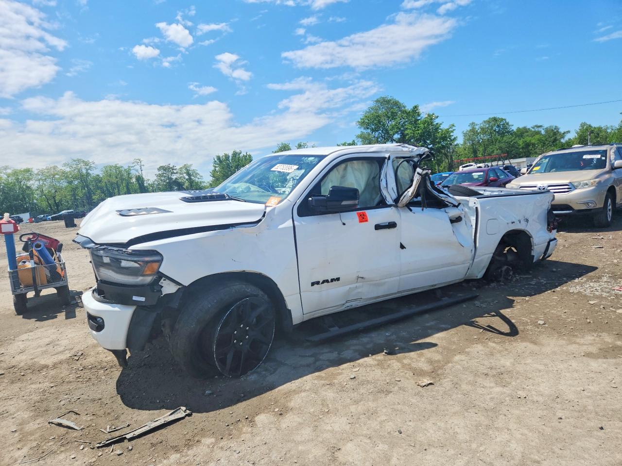 2023 Ram 1500 Laramie, VIN 1C6SRFJT0PN542634 — Rollover