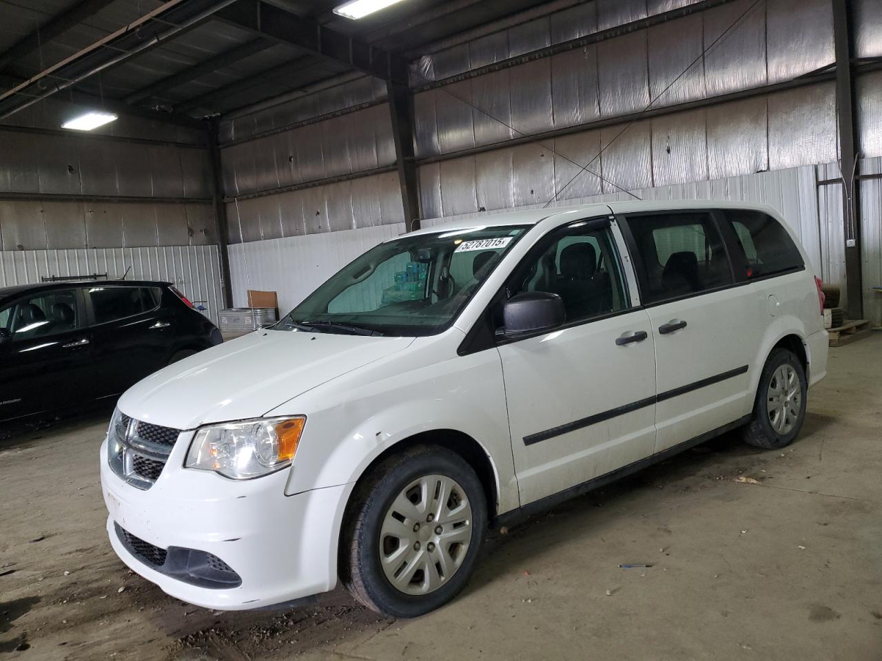 2015 Dodge Grand Caravan SE, VIN 2C4RDGBG5FR615933 — Partial repair