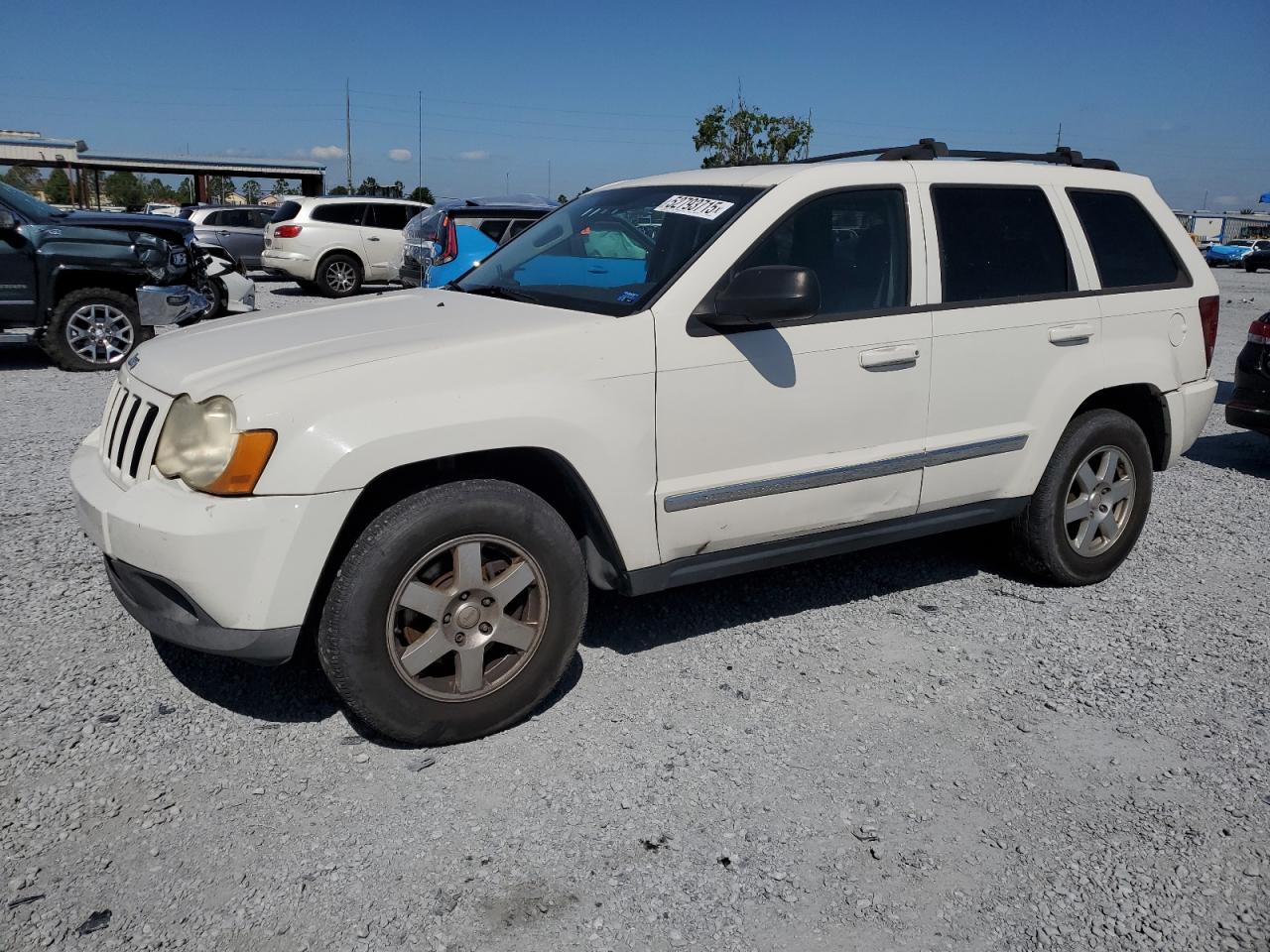 2010 Jeep Grand Cherokee Laredo, VIN 1J4PS4GK9AC121322 — Rear end