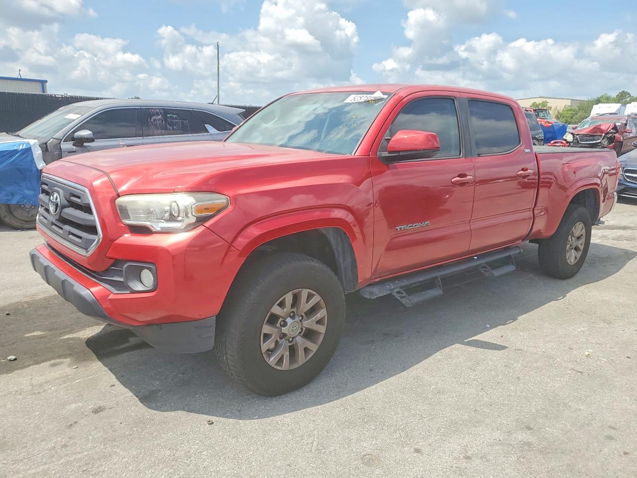 2016 Toyota Tacoma SR5, VIN 5TFBZ5DN2GX001783 — Фото с аукциона 1 of 4