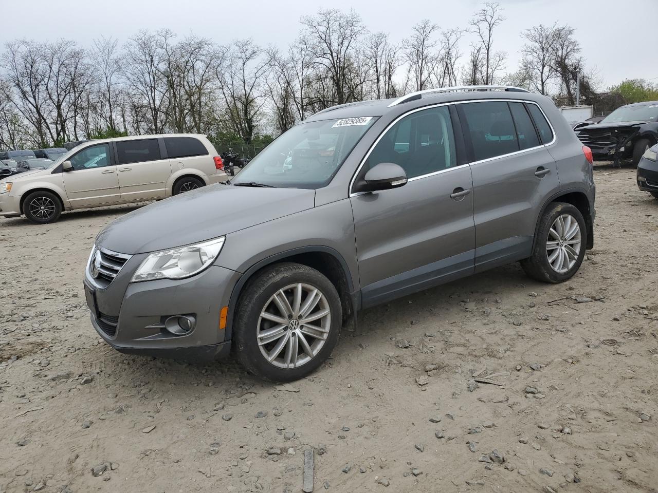 2011 Volkswagen Tiguan S, VIN WVGBV7AX6BW520780 — Мелкие вмятины и царапины