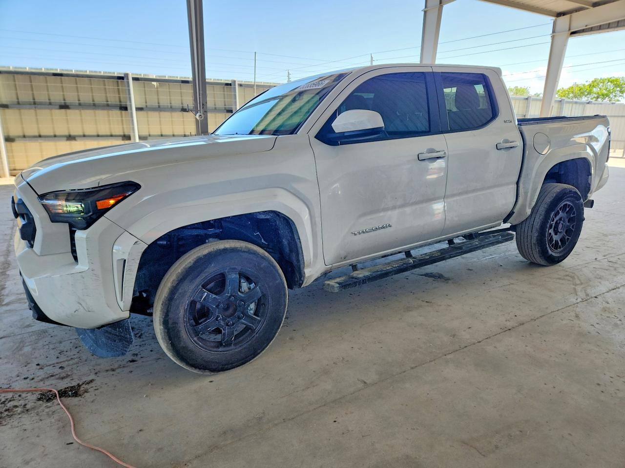 2025 Toyota Tacoma SR5, VIN 3TMKB5FN3SM049373 — Minor dents and scratches