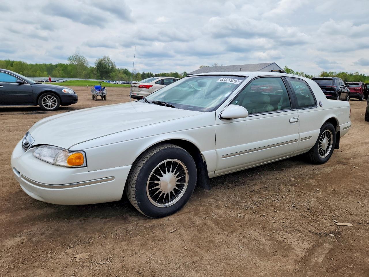 1997 Mercury Cougar, VIN 1MELM62WXVH630203 — Hail