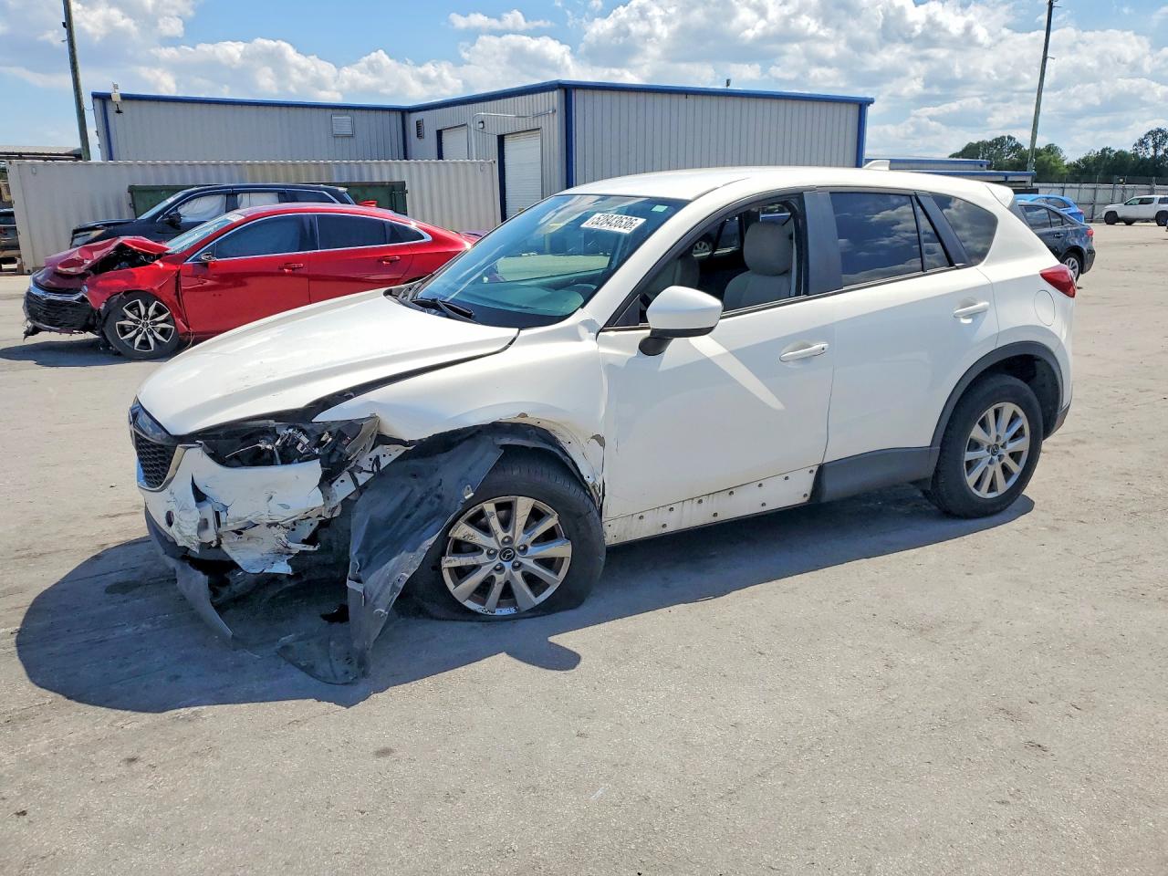 2014 Mazda CX-5 Touring, VIN JM3KE4CY7E0322605 — Front end