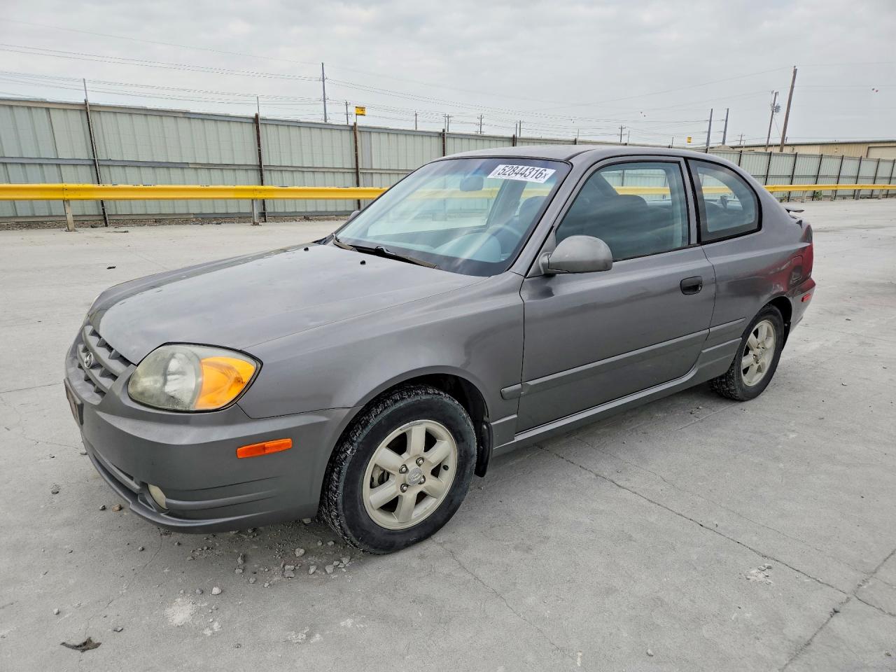 2005 Hyundai Accent GLS, VIN KMHCG35C75U322188 — Град