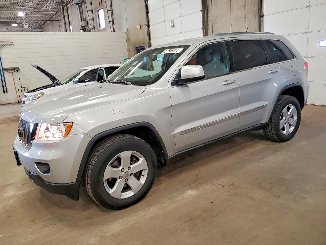 2012 Jeep Grand Cherokee Laredo, VIN 1C4RJFAG2CC227311 — Front end