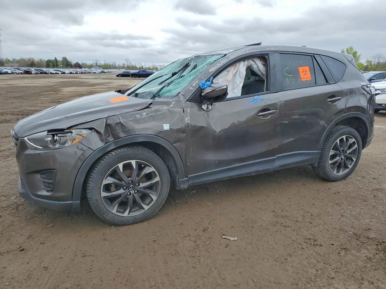 2016 Mazda CX-5 Grand Touring, VIN JM3KE4DY4G0733820 — Опрокидывание