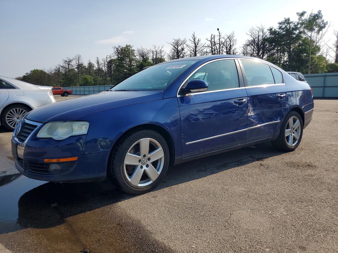 2009 Volkswagen Passat Komfort, VIN WVWJK73C19E013224 — Side