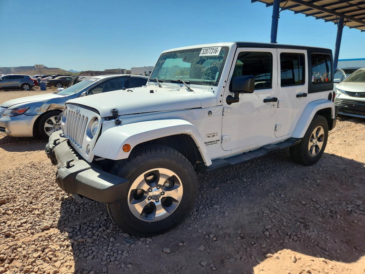 2017 Jeep Wrangler Unlimited Sahara, VIN 1C4HJWEG4HL595177 — Front end