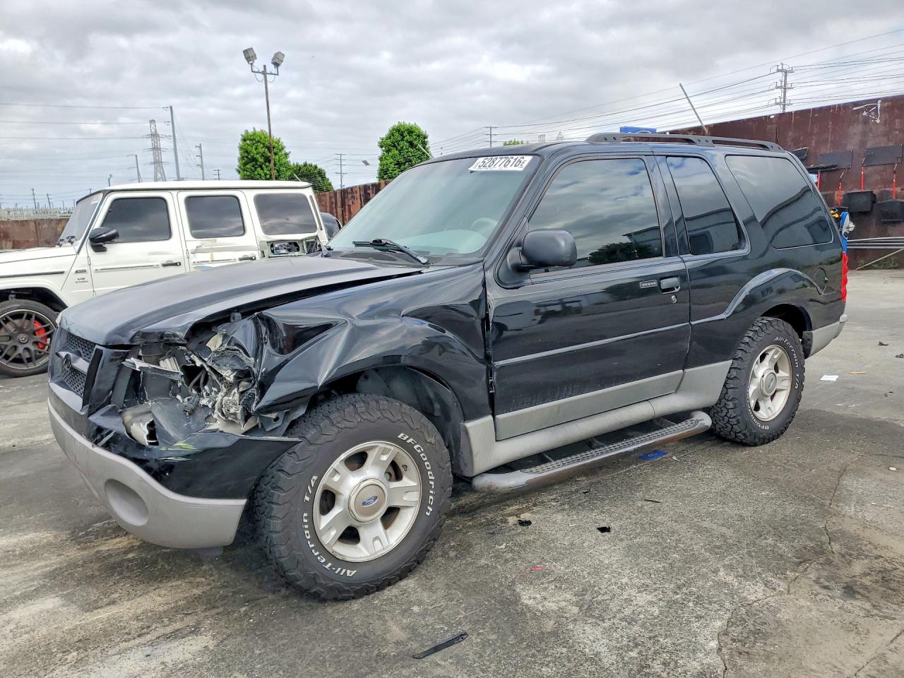 2003 Ford Explorer Sport XLS, VIN 1FMZU70E33UA31557 — Front end