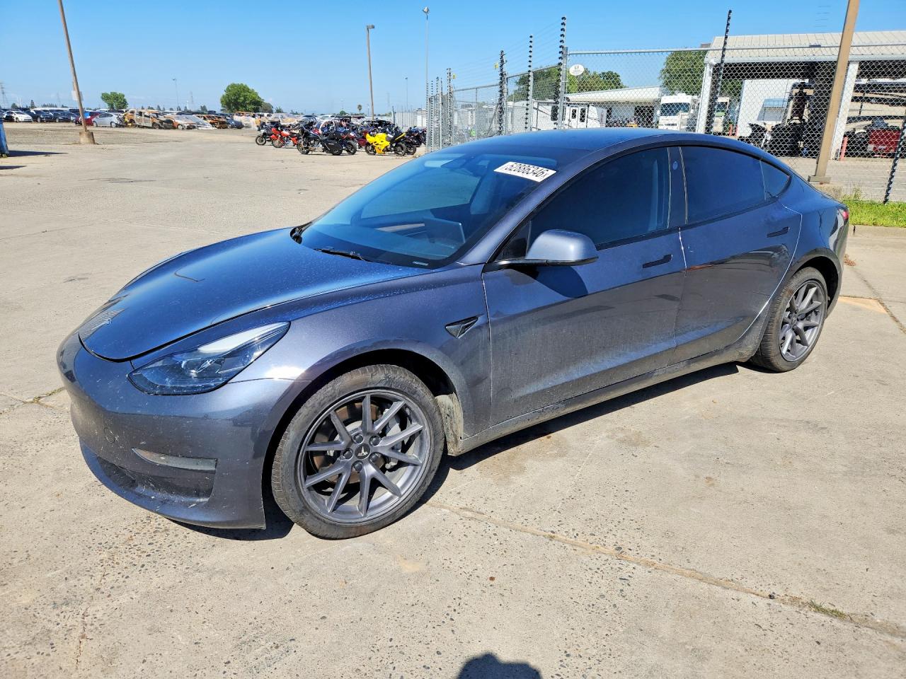 2023 Tesla Model 3, VIN 5YJ3E1EA0PF599838 — Side
