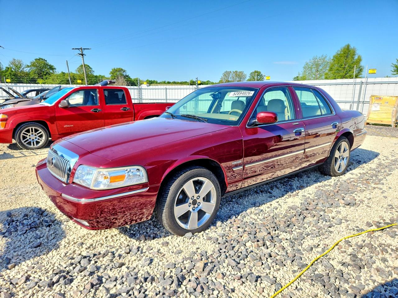 2009 Mercury Grand Marquis LS, VIN 2MEHM75V29X614551 — Hail