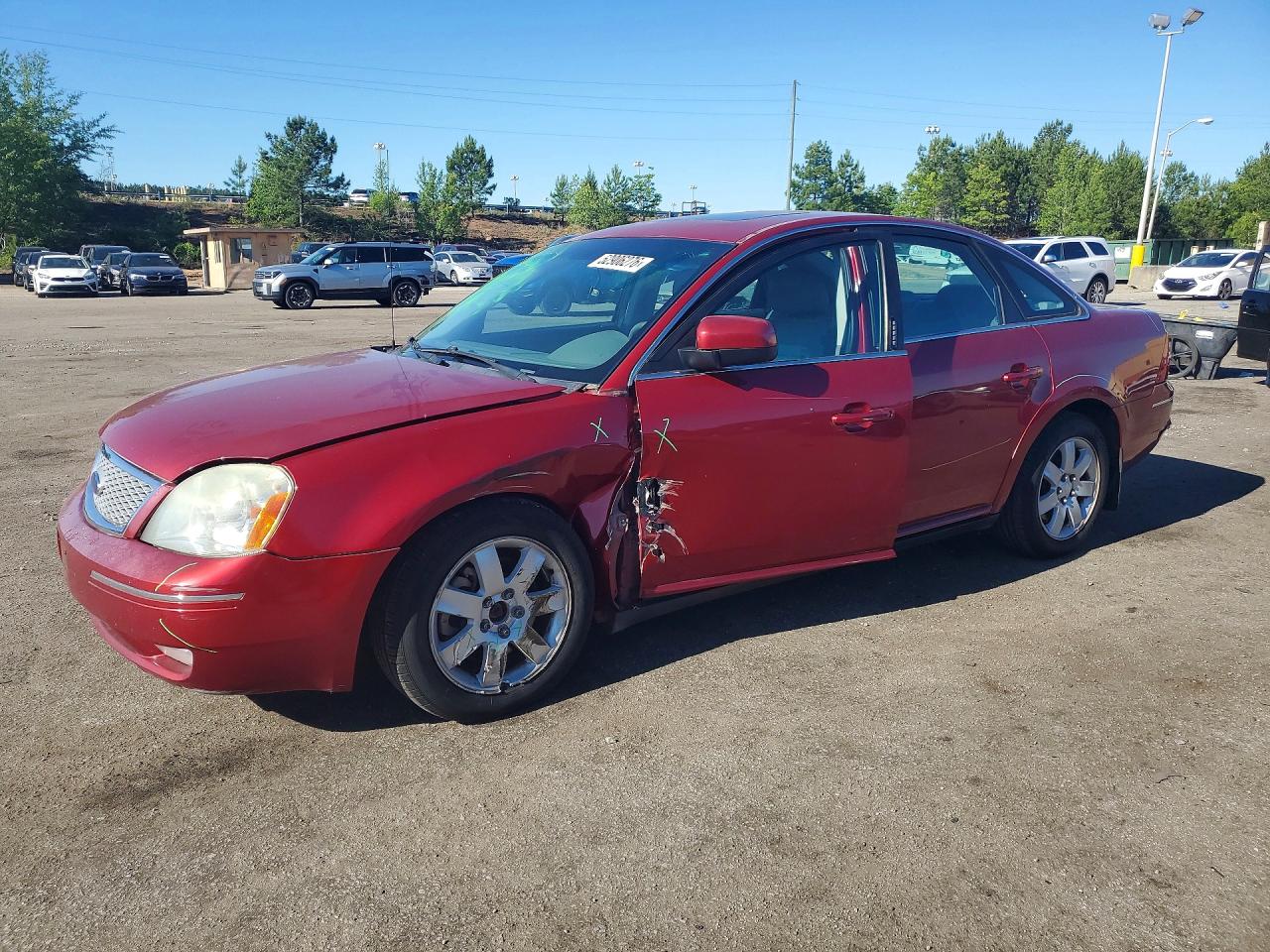 2007 Ford Five Hundred SEL, VIN 1FAHP24177G162633 — Side