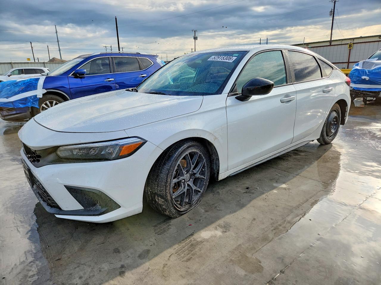2023 Honda Civic Sport, VIN 19XFL2H85PE015182 — Front end
