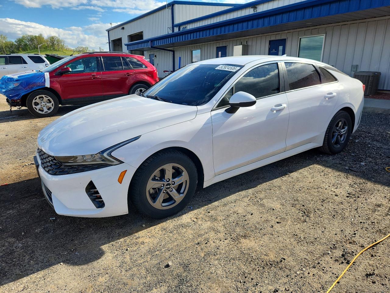 2022 Kia K5 LXS, VIN 5XXG14J27NG157713 — Hail