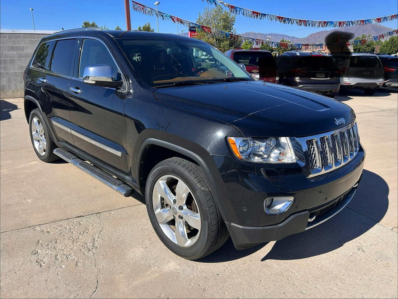2013 Jeep Grand Cherokee Overland, VIN 1C4RJFCT6DC581652 — Normal wear