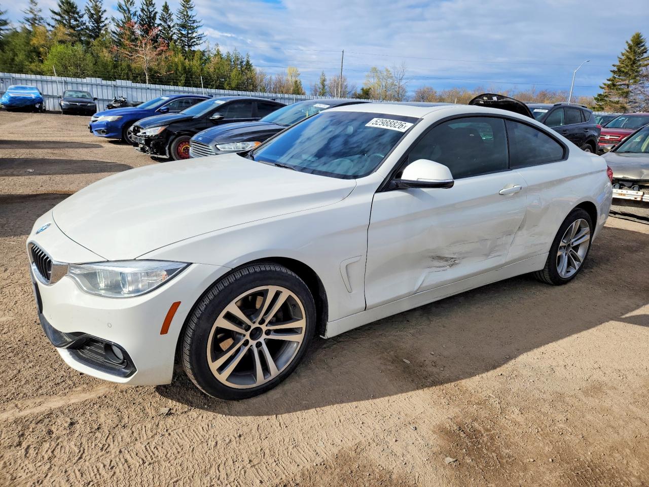 2015 BMW 4 Series 428i xDrive, VIN WBA3N5C53FK198098 — Side