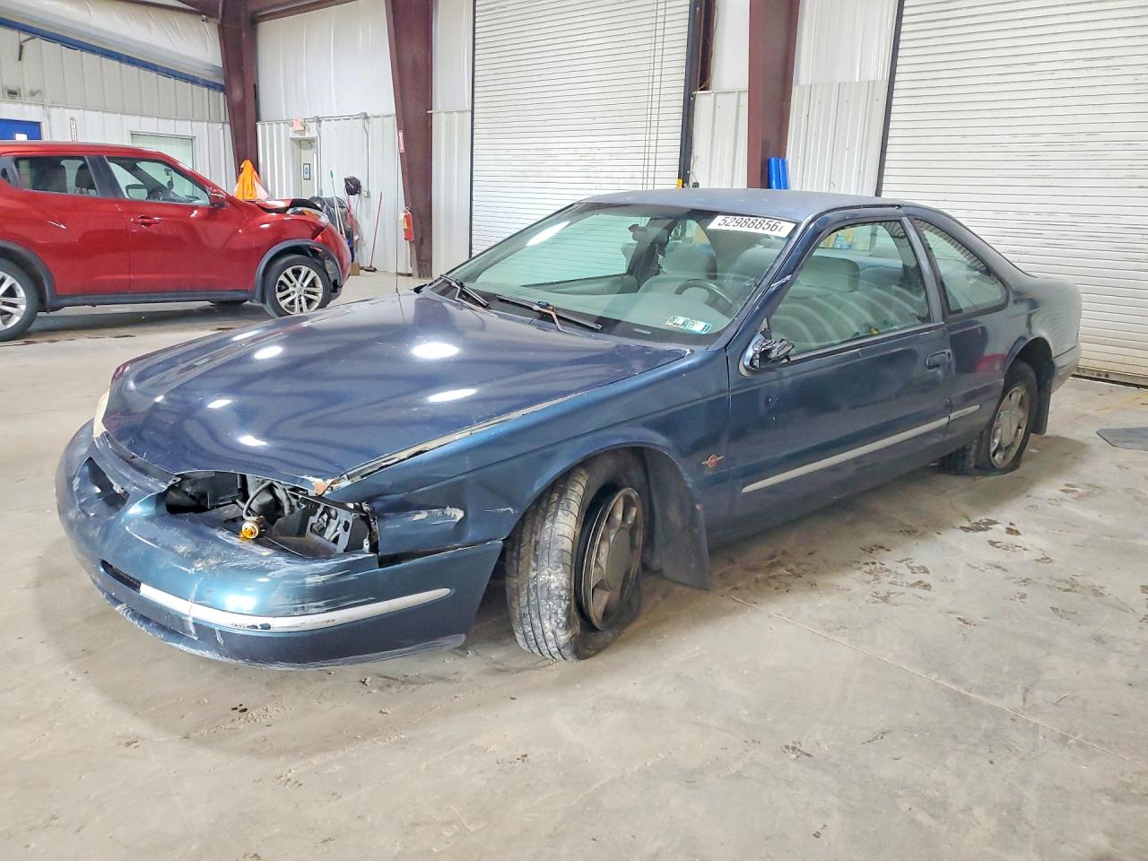 1997 Ford Thunderbird LX, VIN 1FALP624XVH119331 — Undercarriage